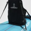 Rider converting SUP to kayak mode with paddle switch